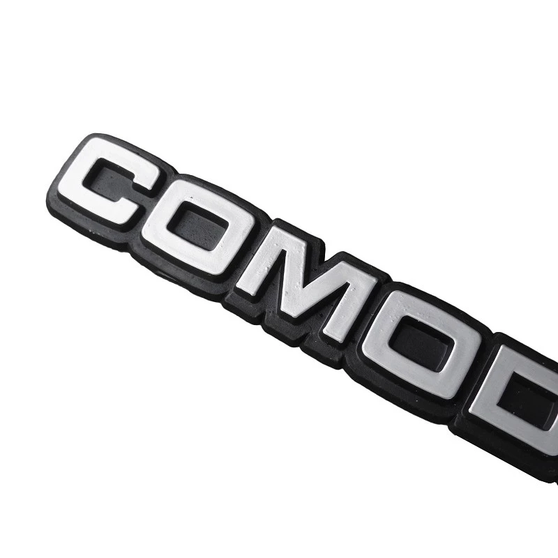 Emblema Comodoro Opala e Caravan 1980 a 1990 Prata Plástico