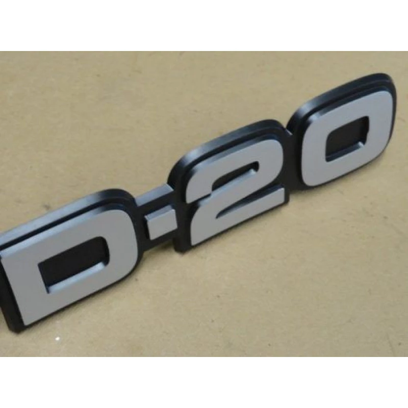 Emblema D-20 85 à 94 Plástico Cinza