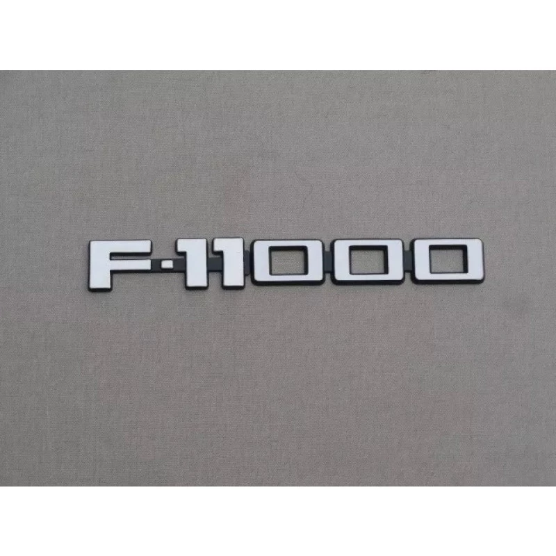 Emblema F-11000 Plástico - Par