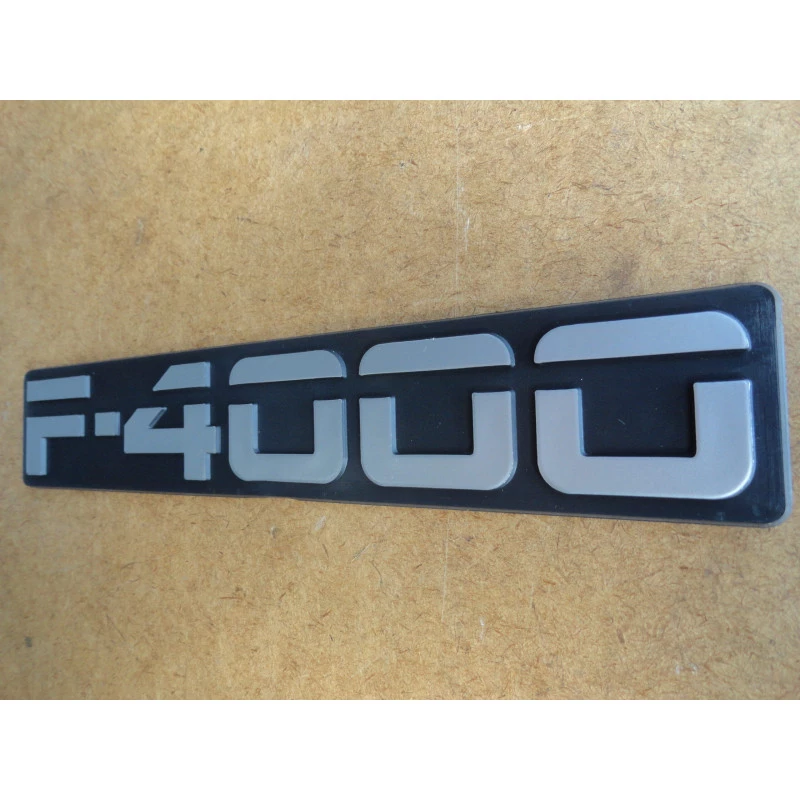 Emblema F-4000 93 à 95 Cinza Lateral