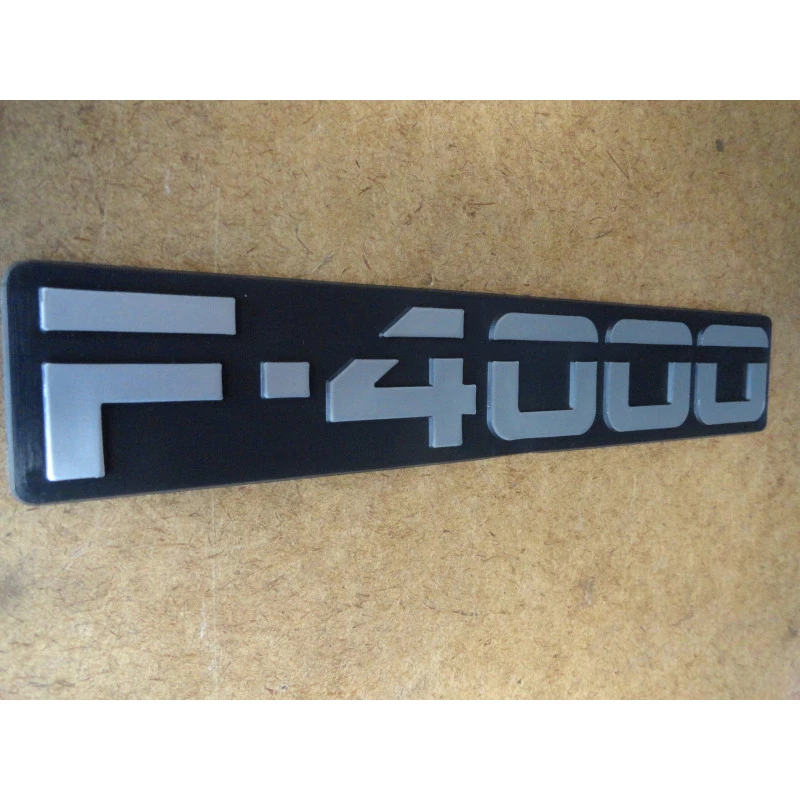 Emblema F-4000 93 à 95 Cinza Lateral