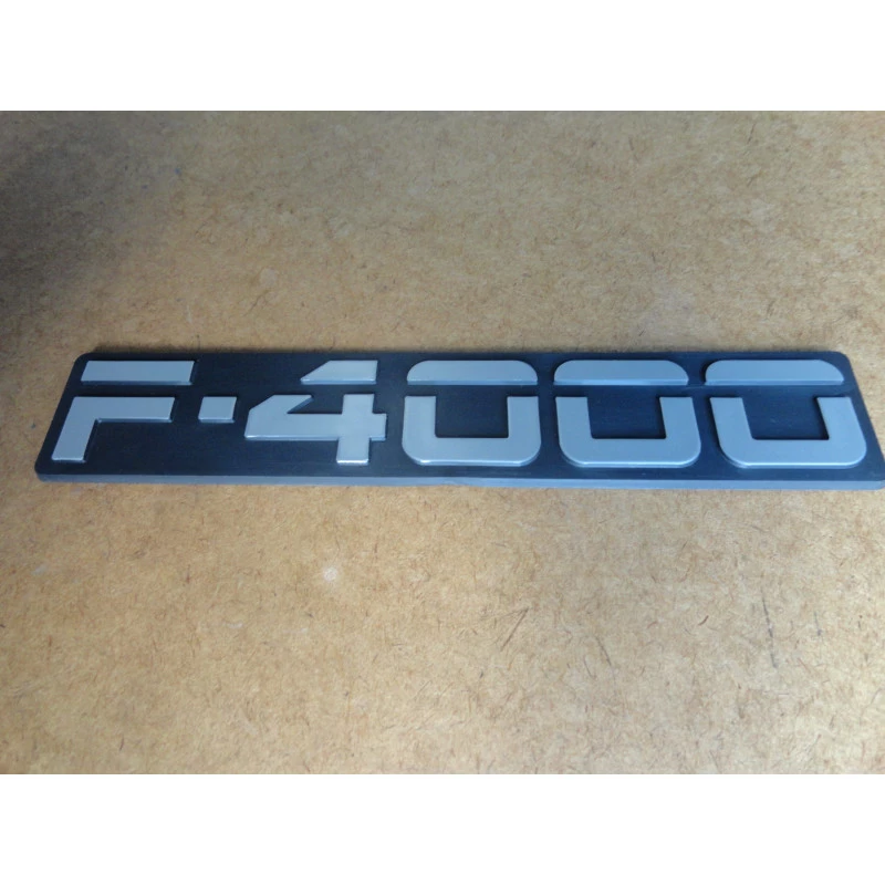 Emblema F-4000 93 à 95 Cinza Lateral
